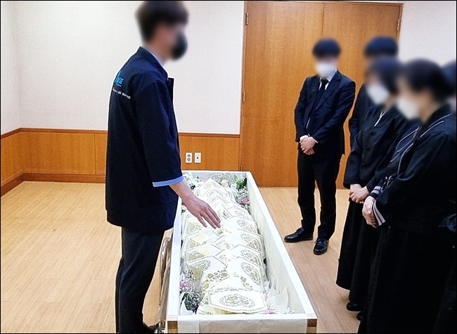 장례지돗